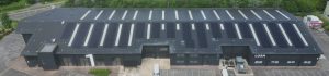 Solar panel installation on the roof of the Lush Cosmetics manufacturing warehouse